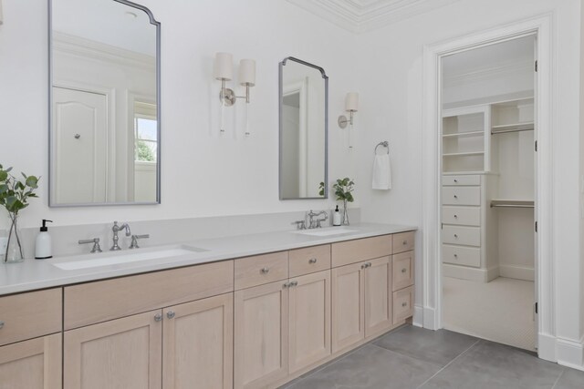 2455 Hidden River Ln, Franklin, TN 37069 - bathroom with ornamental molding, double vanity, a walk in closet, and tile patterned floors