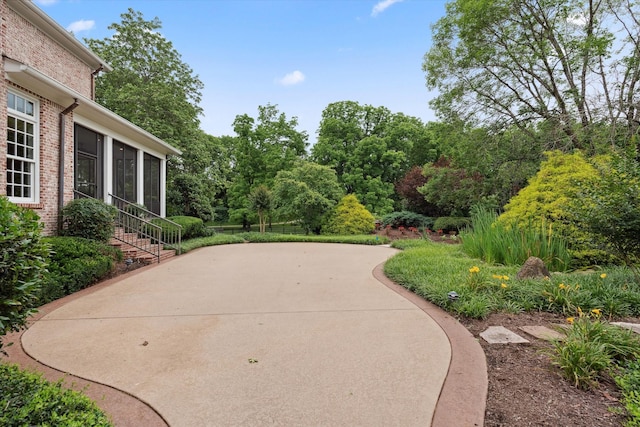 2455 Hidden River Ln, Franklin, TN 37069 - view of patio / terrace with a sunroom