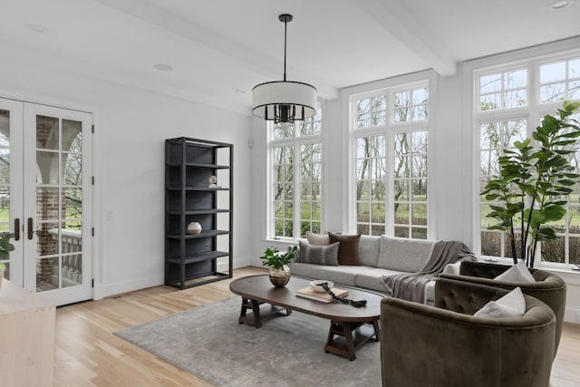 2455 Hidden River Ln, Franklin, TN 37069 - sunroom / solarium with french doors, beam ceiling, plenty of natural light, and a chandelier