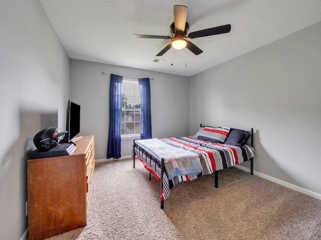 3786 Man O War Blvd, Clarksville, TN 37042 - bedroom featuring light colored carpet, a textured ceiling, and ceiling fan