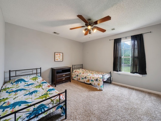 3786 Man O War Blvd, Clarksville, TN 37042 - bedroom featuring light colored carpet, a textured ceiling, and ceiling fan