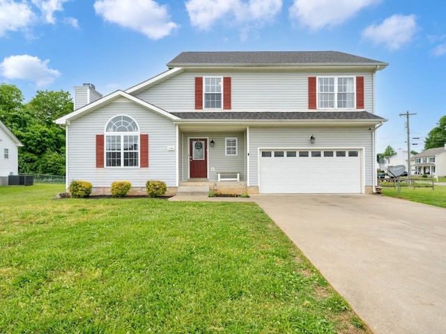 3786 Man O War Blvd, Clarksville, TN 37042 - view of front of home featuring an attached garage, driveway, and a chimney