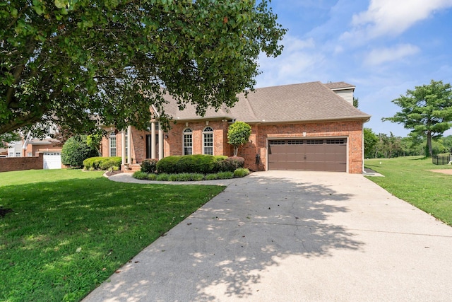 375 Natchez Trace Ct, Murfreesboro, TN 37127 - view of front of home featuring a front lawn, brick siding, driveway, and an attached garage