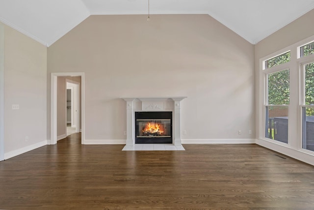 375 Natchez Trace Ct, Murfreesboro, TN 37127 - unfurnished living room with a tiled fireplace, dark wood-type flooring, crown molding, and high vaulted ceiling