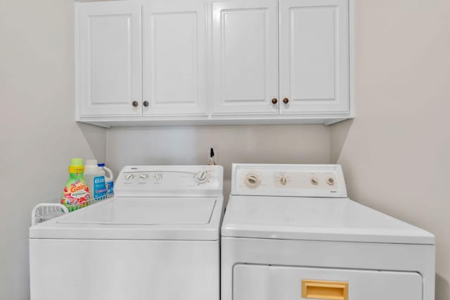 375 Natchez Trace Ct, Murfreesboro, TN 37127 - laundry area featuring independent washer and dryer and cabinet space