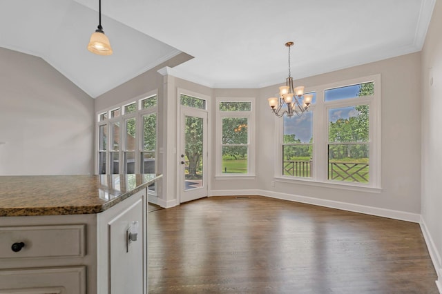 375 Natchez Trace Ct, Murfreesboro, TN 37127 - unfurnished dining area featuring dark wood finished floors, a chandelier, ornamental molding, and vaulted ceiling
