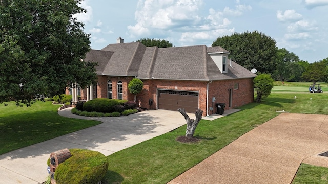 375 Natchez Trace Ct, Murfreesboro, TN 37127 - view of front facade featuring brick siding, a front lawn, driveway, and a garage