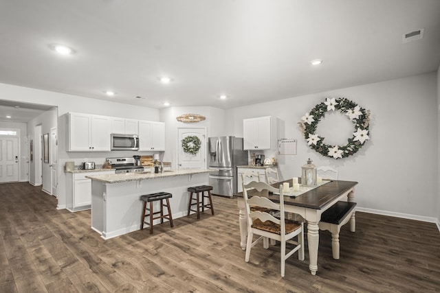 2028 Tate Farm Ln, White House, TN 37188 - dining room featuring dark wood finished floors and recessed lighting