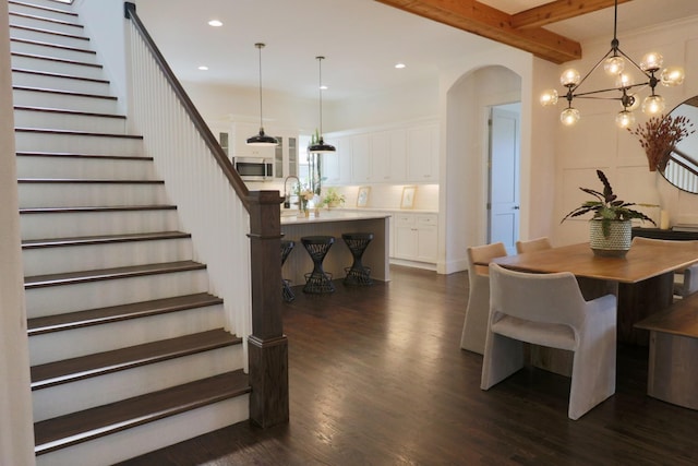 2207 Pennington Bend Rd Unit 3, Nashville, TN 37214 - dining area featuring dark wood-style flooring, stairway, recessed lighting, arched walkways, and beam ceiling