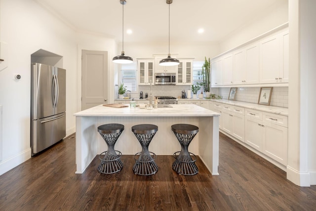 2207 Pennington Bend Rd Unit 3, Nashville, TN 37214 - kitchen with stainless steel appliances, decorative backsplash, white cabinets, ornamental molding, and recessed lighting
