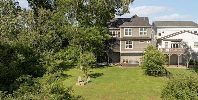 2207 Pennington Bend Rd Unit 3, Nashville, TN 37214 - rear view of house with a yard, a wooden deck, and a patio area