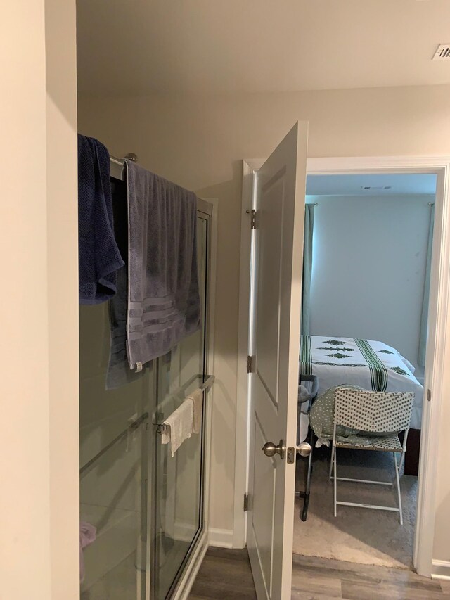 2500 Haskell Dr, Antioch, TN 37013 - bathroom with wood finished floors and a shower stall