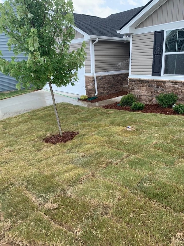 2500 Haskell Dr, Antioch, TN 37013 - view of green lawn featuring concrete driveway