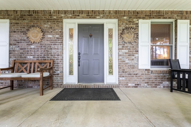 1830 Bradbury Rd, Adams, TN 37010 - doorway to property with a porch and brick siding