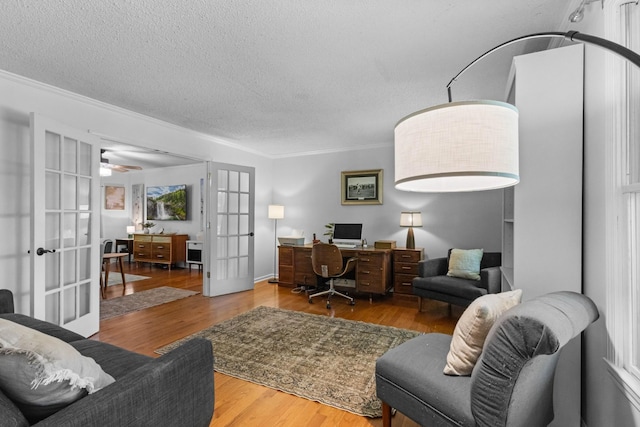 1830 Bradbury Rd, Adams, TN 37010 - office space featuring french doors, wood finished floors, a textured ceiling, ornamental molding, and a ceiling fan