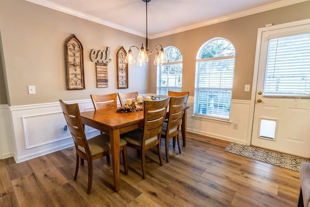 1699 Burnt Oak Dr Unit 195, Dalton, GA 30721 - dining space featuring wood finished floors, a chandelier, wainscoting, crown molding, and a decorative wall