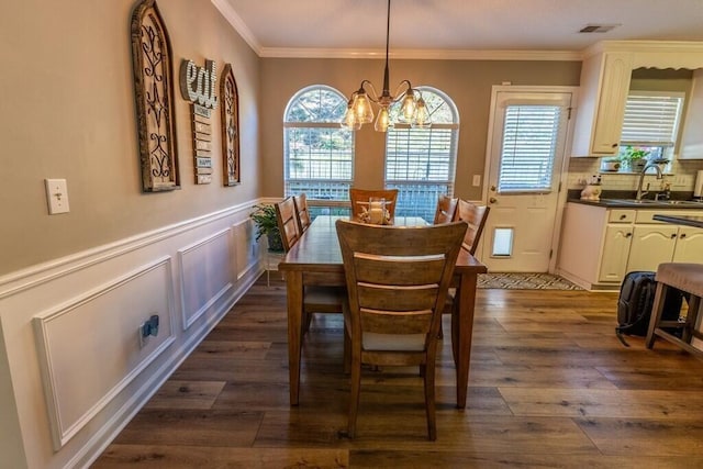 1699 Burnt Oak Dr Unit 195, Dalton, GA 30721 - dining area with a chandelier, dark wood-style floors, ornamental molding, wainscoting, and a decorative wall
