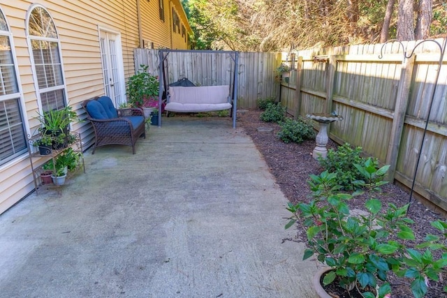 1699 Burnt Oak Dr Unit 195, Dalton, GA 30721 - fenced backyard with a patio