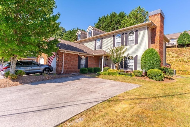 1699 Burnt Oak Dr Unit 195, Dalton, GA 30721 - view of front of property with a chimney, a front lawn, and brick siding