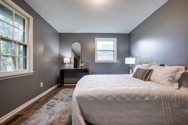 1529 W Grab Creek Rd, Dickson, TN 37055 - bedroom featuring dark wood finished floors and a textured ceiling