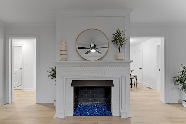 109 Anderson Dr, Chattanooga, TN 37421 - detailed view of wood finished floors, a ceiling fan, a fireplace, and ornamental molding