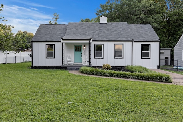 109 Anderson Dr, Chattanooga, TN 37421 - view of front of home featuring a shingled roof, a chimney, and board and batten siding
