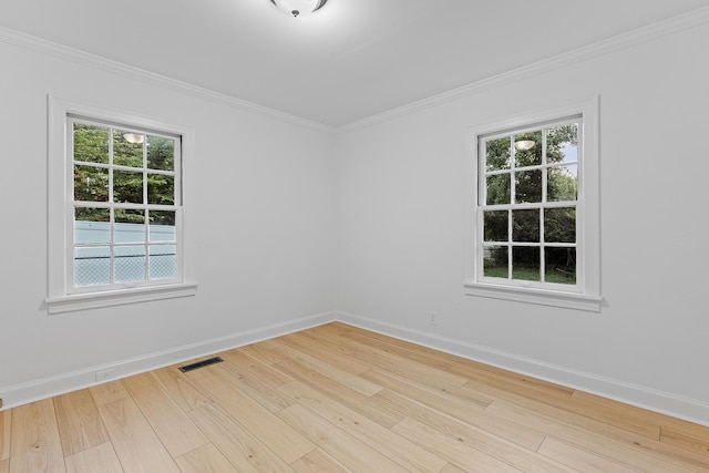 109 Anderson Dr, Chattanooga, TN 37421 - spare room featuring wood finished floors, plenty of natural light, and crown molding