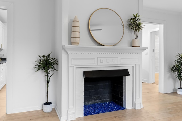 109 Anderson Dr, Chattanooga, TN 37421 - detailed view of wood finished floors, a fireplace, and crown molding