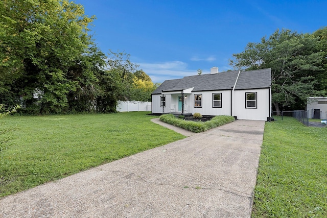 109 Anderson Dr, Chattanooga, TN 37421 - ranch-style house featuring a shingled roof, a chimney, and driveway