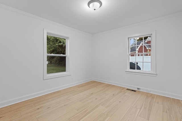 109 Anderson Dr, Chattanooga, TN 37421 - spare room featuring healthy amount of natural light, light wood-style floors, and ornamental molding
