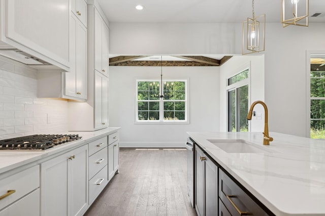 508 Matthew Miller Dr, Smyrna, TN 37167 - kitchen featuring stainless steel appliances, a chandelier, wood finished floors, healthy amount of natural light, and recessed lighting
