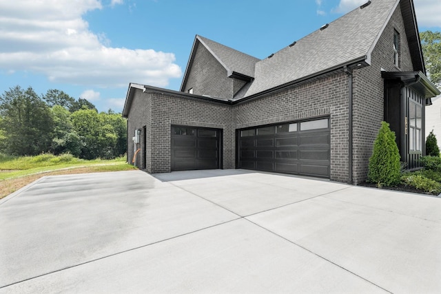 508 Matthew Miller Dr, Smyrna, TN 37167 - view of property exterior with brick siding, an attached garage, concrete driveway, and a shingled roof