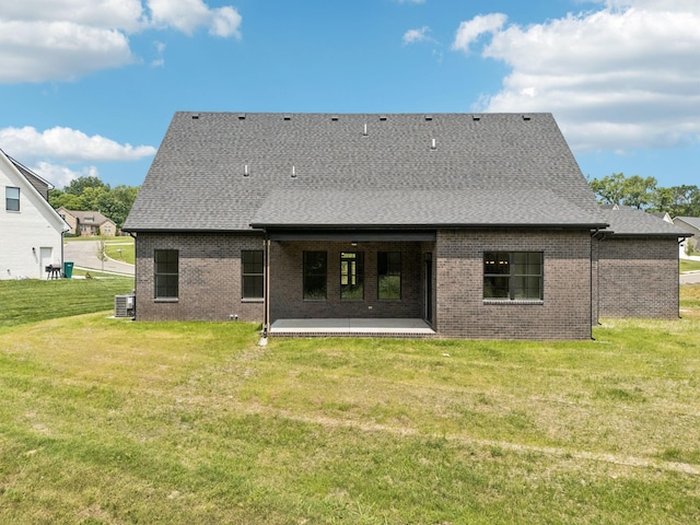 508 Matthew Miller Dr, Smyrna, TN 37167 - back of house featuring a patio area, roof with shingles, brick siding, and a lawn