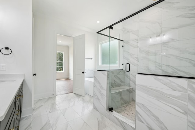 508 Matthew Miller Dr, Smyrna, TN 37167 - full bathroom with marble finish floors, a marble finish shower, vanity, a garden tub, and recessed lighting