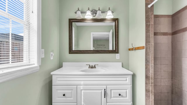 1676 Keeble St, Chattanooga, TN 37412 - full bathroom featuring plenty of natural light, vanity, and a tile shower