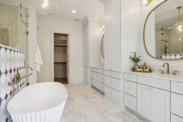 8876 Edgecomb Dr, College Grove, TN 37046 - full bathroom with tiled shower, vanity, a freestanding tub, marble finish flooring, and a spacious closet