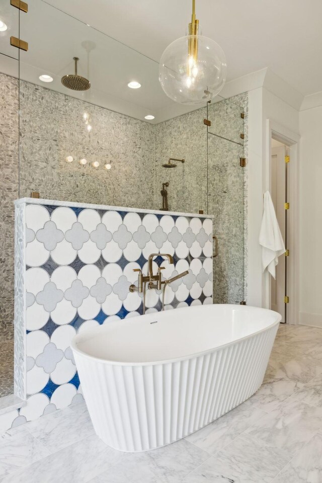 8876 Edgecomb Dr, College Grove, TN 37046 - bathroom with a shower stall, marble look tiles, a soaking tub, and recessed lighting