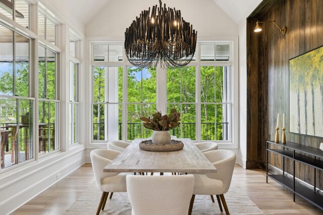 8876 Edgecomb Dr, College Grove, TN 37046 - sunroom featuring lofted ceiling, a chandelier, plenty of natural light, wood finished floors, and french doors