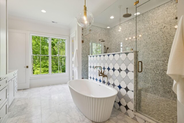 8876 Edgecomb Dr, College Grove, TN 37046 - bathroom featuring a shower stall, plenty of natural light, vanity, a freestanding tub, and recessed lighting