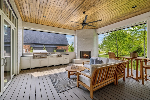 8876 Edgecomb Dr, College Grove, TN 37046 - wooden deck with an outdoor living space with a fireplace, area for grilling, and a ceiling fan