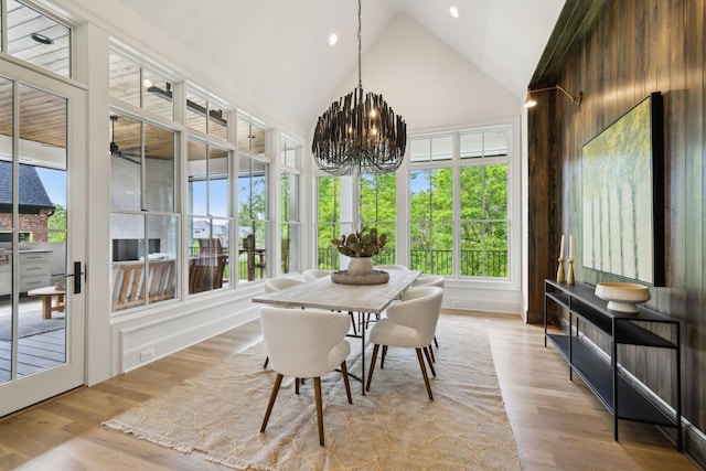8876 Edgecomb Dr, College Grove, TN 37046 - sunroom featuring high vaulted ceiling, wood finished floors, a chandelier, and recessed lighting