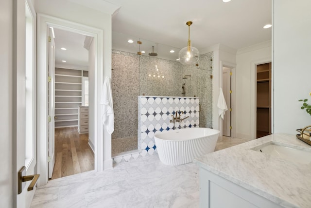 8876 Edgecomb Dr, College Grove, TN 37046 - full bath with a spacious closet, a walk in shower, vanity, recessed lighting, and a freestanding tub