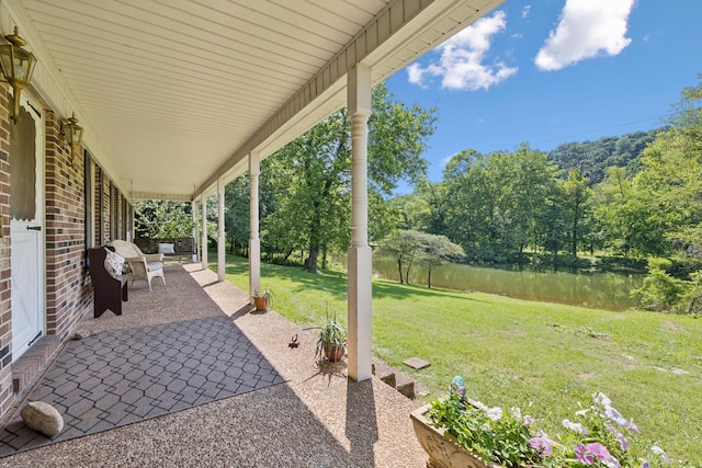8663 Dog Branch Rd, Mount Pleasant, TN 38474 - view of patio featuring view of wooded area