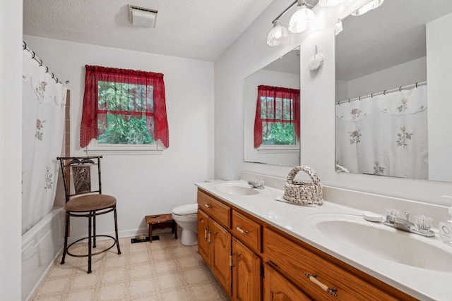 8663 Dog Branch Rd, Mount Pleasant, TN 38474 - full bath featuring double vanity, tile patterned floors, a textured ceiling, and shower / bath combo with shower curtain