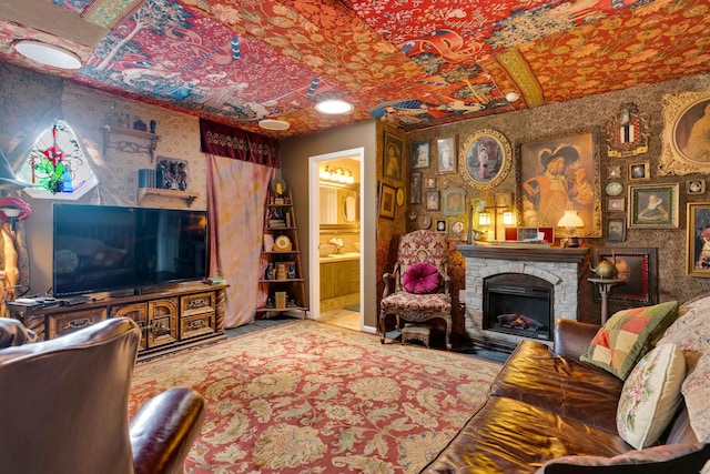 997 W 12th St, Chickamauga, GA 30707 - living area with wallpapered walls and a fireplace