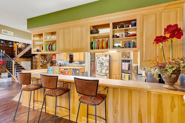 997 W 12th St, Chickamauga, GA 30707 - bar area with stainless steel appliances, dark wood-type flooring, and stairs