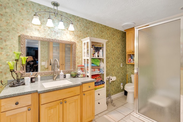 997 W 12th St, Chickamauga, GA 30707 - bathroom with wallpapered walls, vanity, a shower stall, tile patterned flooring, and a textured ceiling