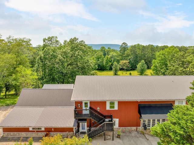997 W 12th St, Chickamauga, GA 30707 - view of front of home with stairs and a metal roof