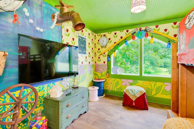 997 W 12th St, Chickamauga, GA 30707 - recreation room with wallpapered walls, plenty of natural light, and wood finished floors