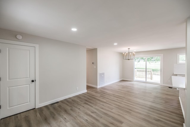 3046 Patton Branch Rd, Goodlettsville, TN 37072 - empty room featuring a chandelier, light wood-style floors, and recessed lighting
